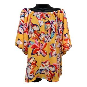 Women’s‎ size medium puff sleeved blouse.